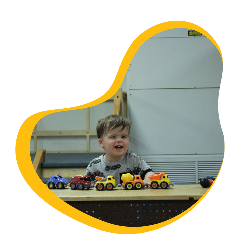 Boy playing at Redwood City Preschool